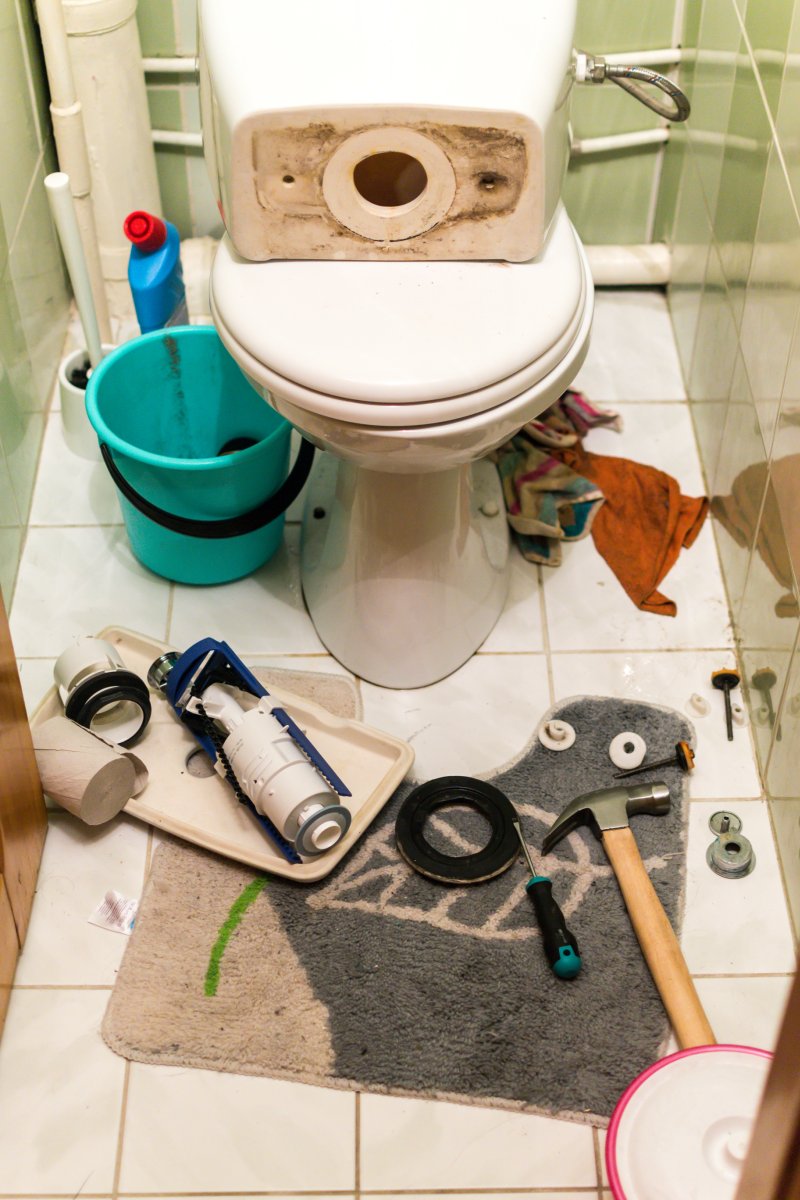 New toilet being installed in a South Lambeth bathroom